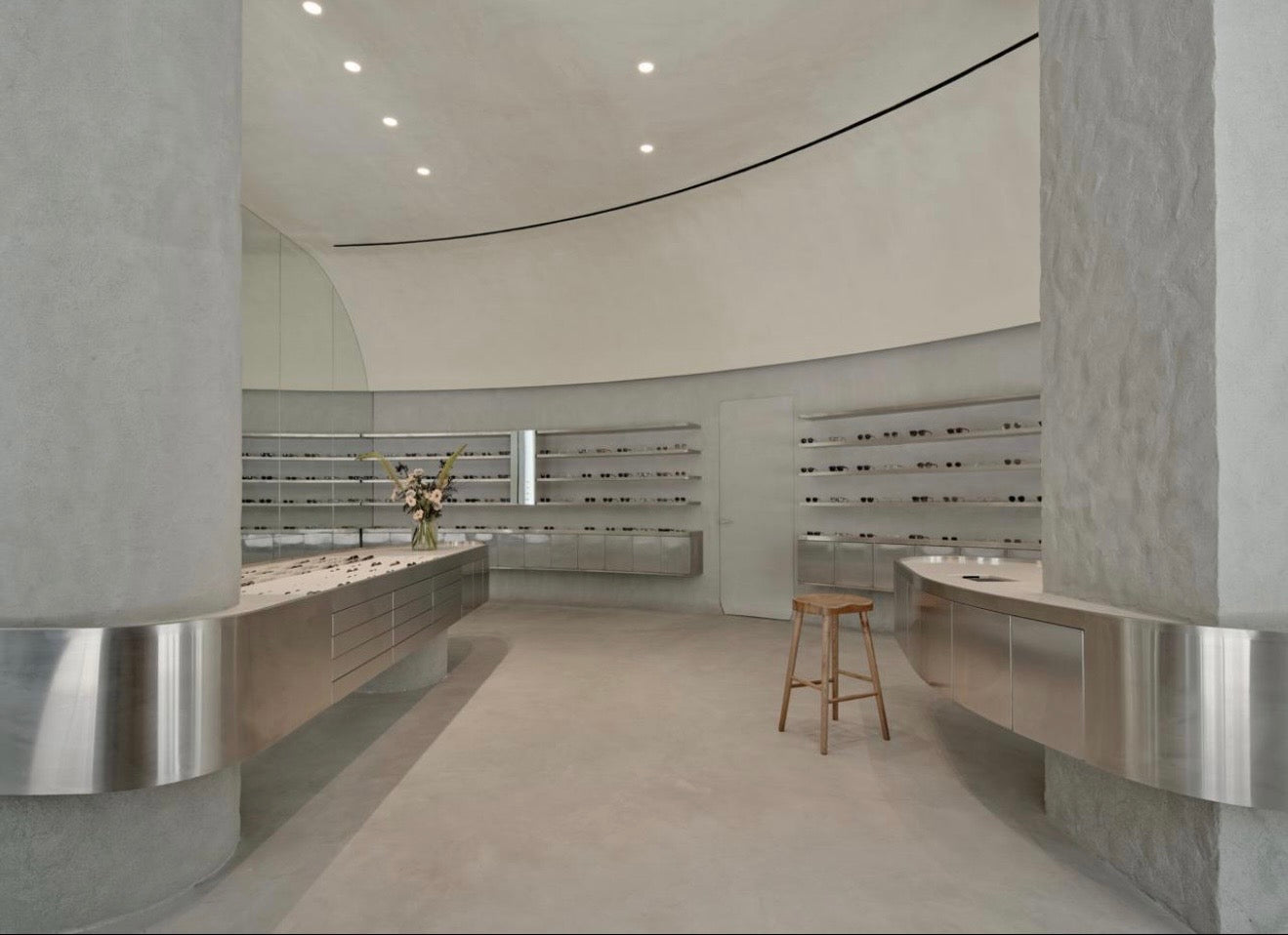Commercial microcement to floors, walls and ceiling in this retail store.