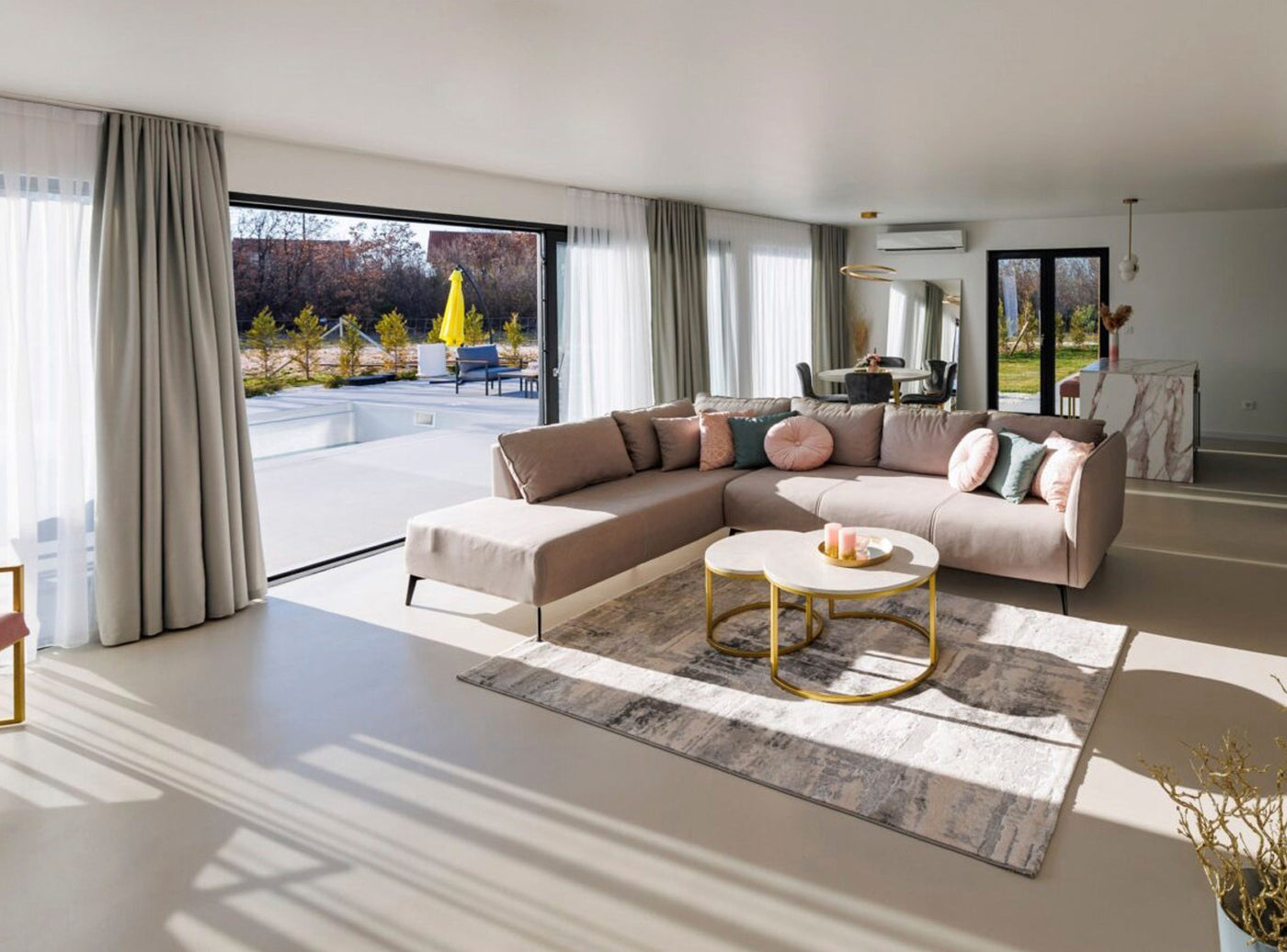 Seamless microcement flooring installed in a Glen Iris home.