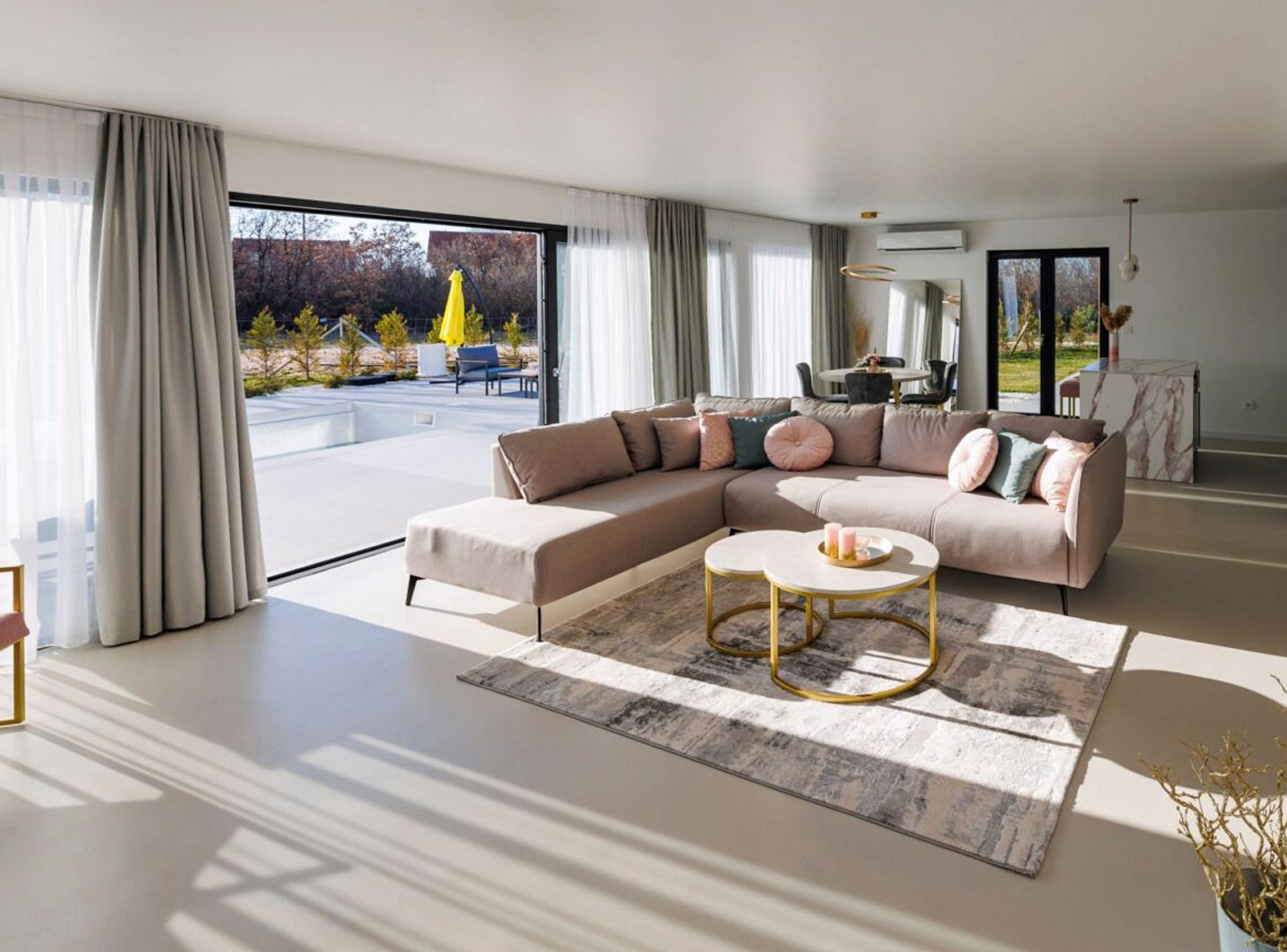 Warm stone-tone microcement floor finish