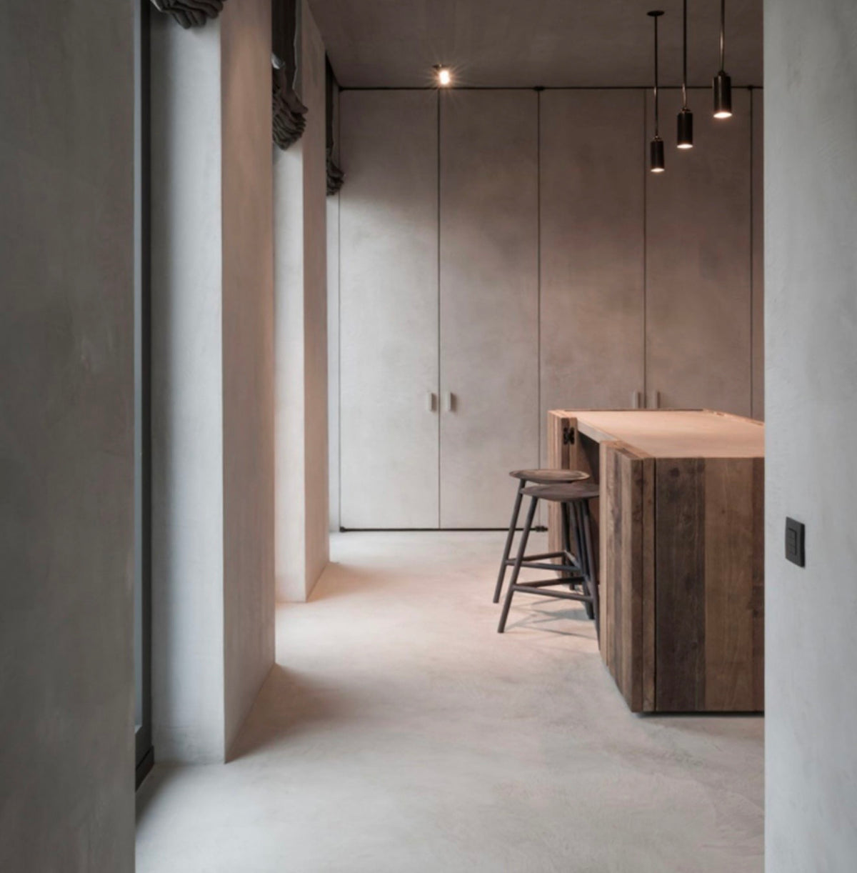 Matte microcement floor finish with natural light